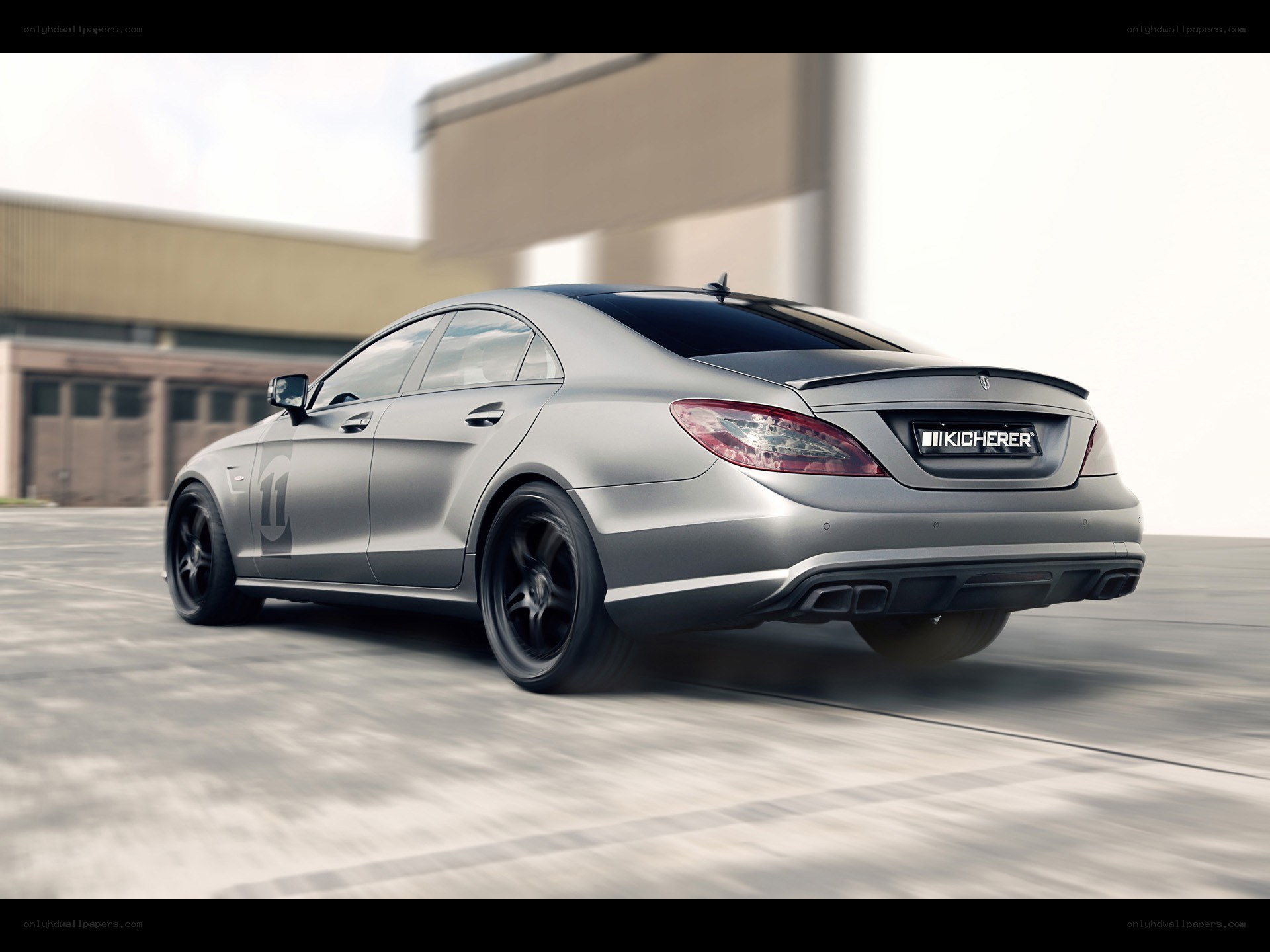 silver sedan in motion