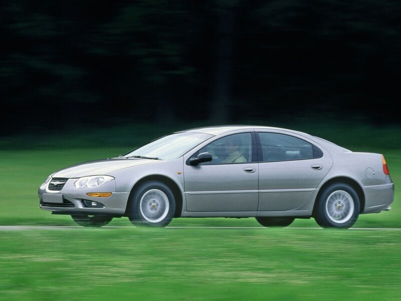 silver sedan in motion