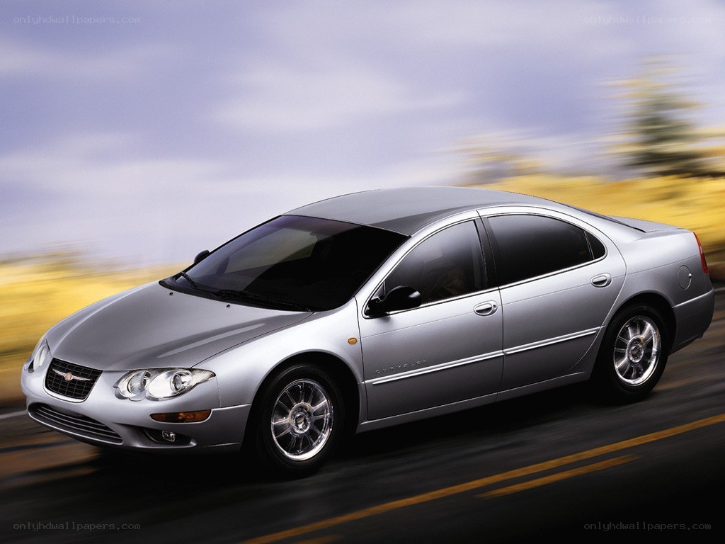 silver sedan in motion