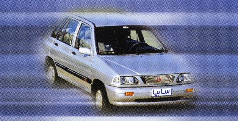 Silver sedan in motion