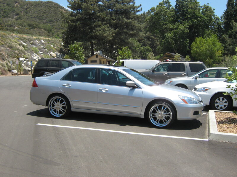 Silver sedan in parking lot