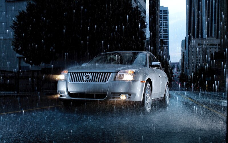 Silver Sedan in Rain