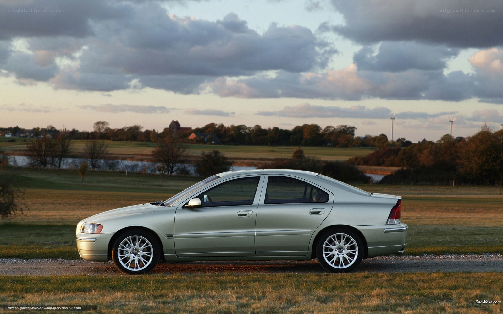 silver sedan in rural landscape