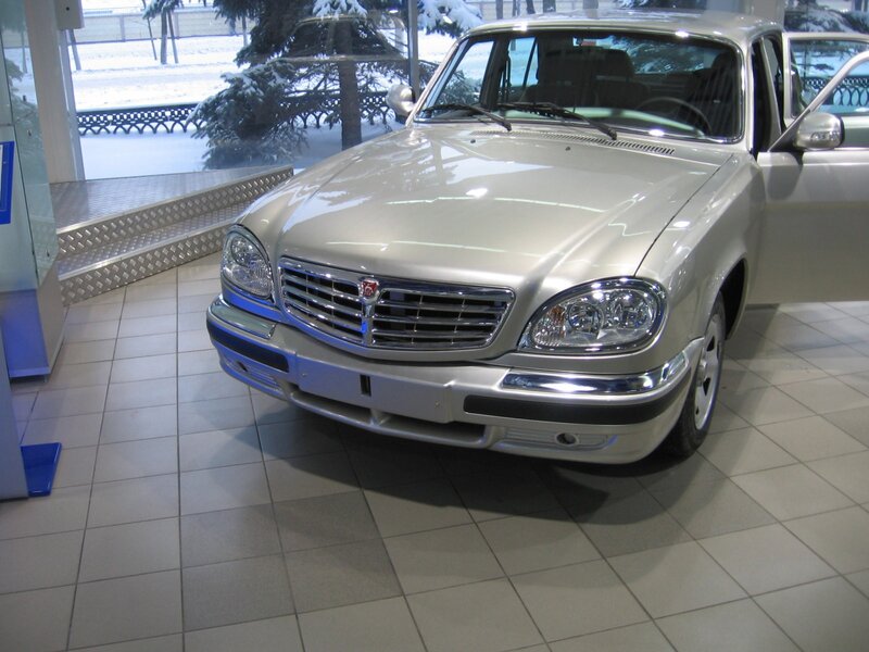 Silver Sedan in Showroom — Neutral