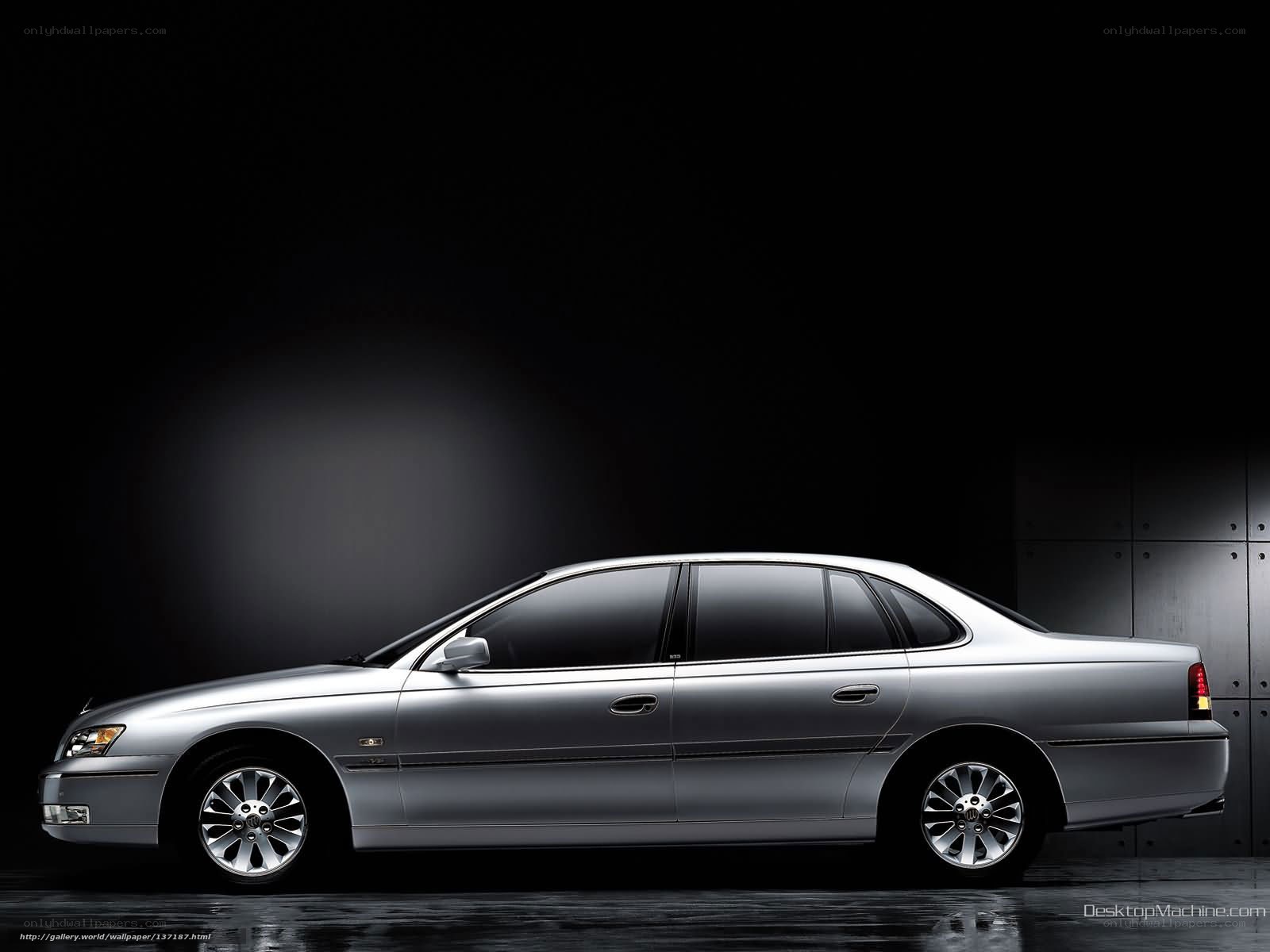 silver sedan in studio