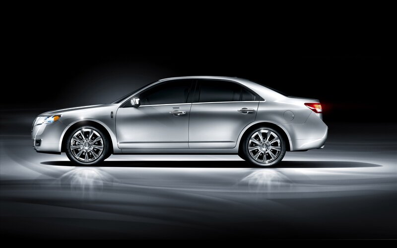 silver sedan in studio