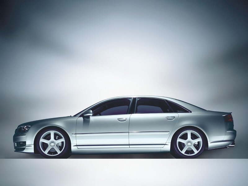 silver sedan in studio