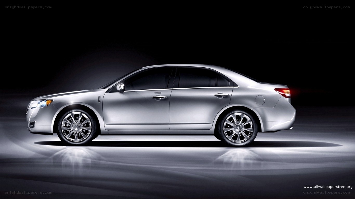 silver sedan in studio