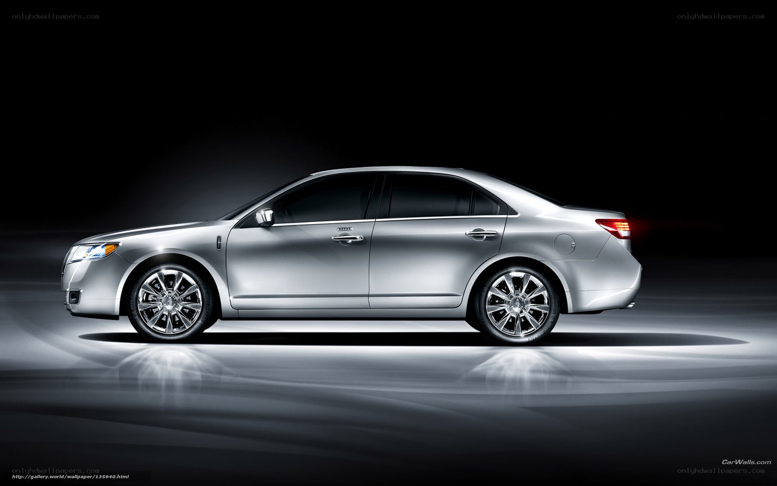 silver sedan in studio