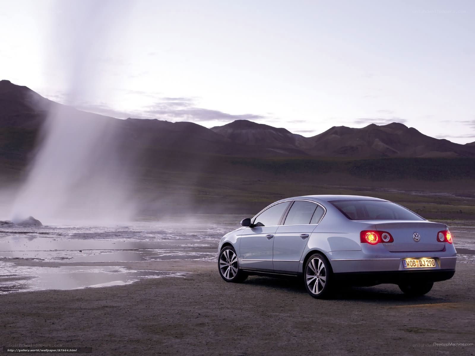 Silver sedan near geyser