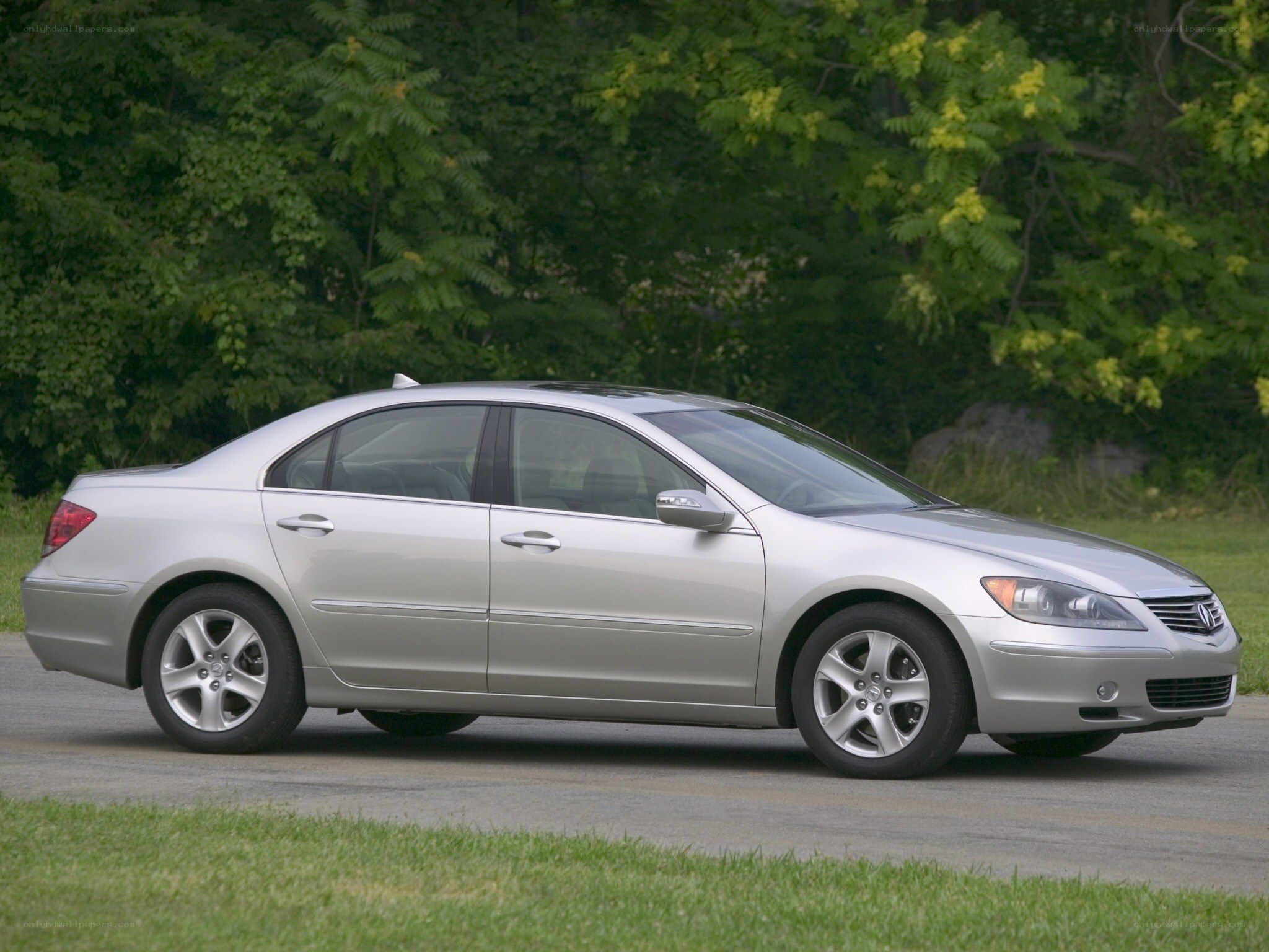 silver sedan on a road