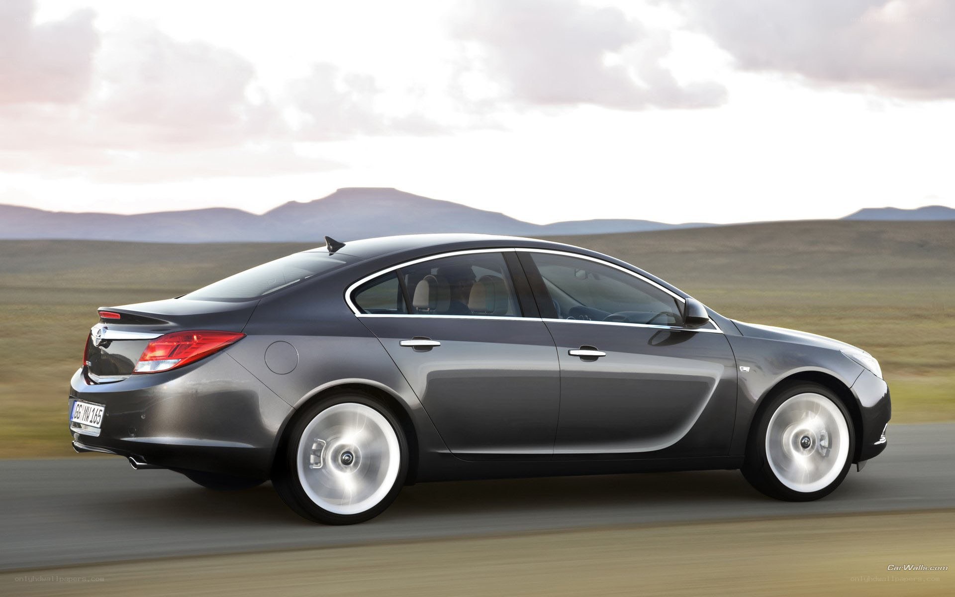 silver sedan on a road