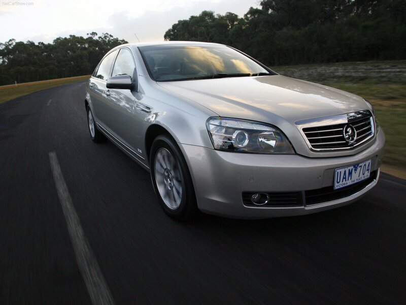 silver sedan on a road