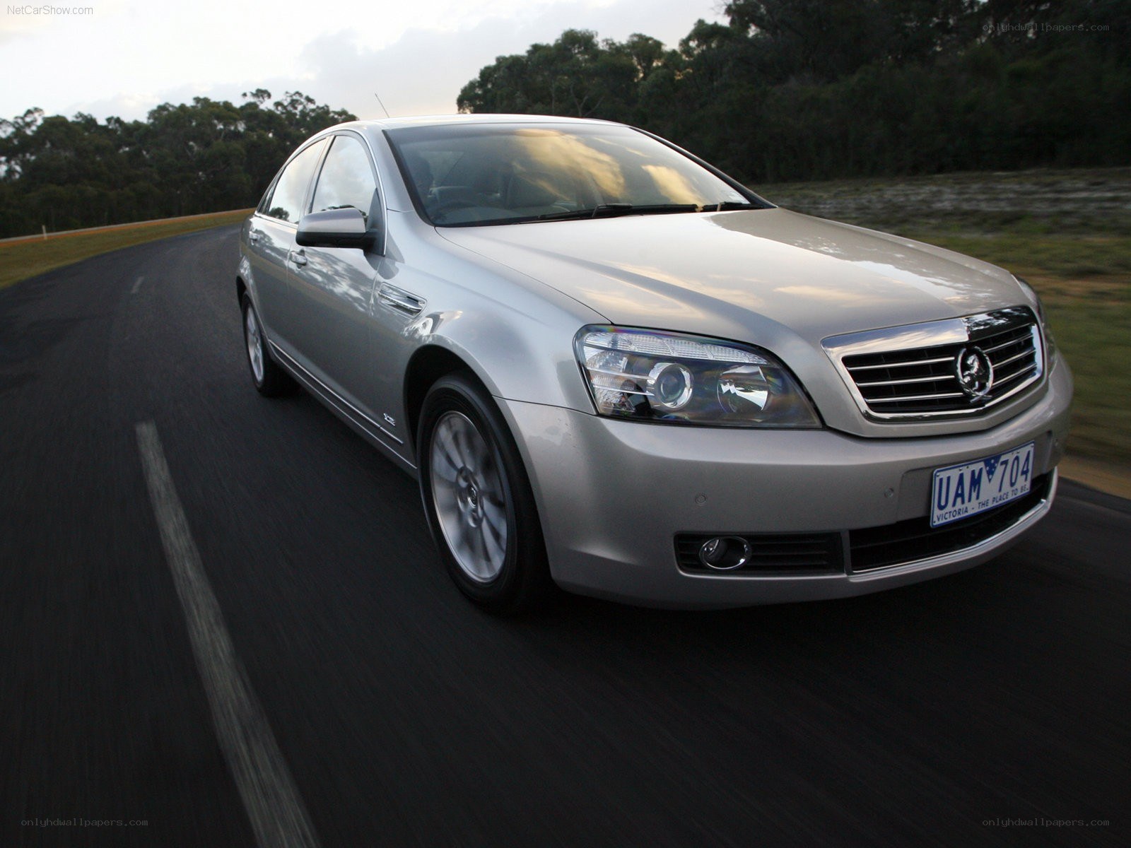 silver sedan on a road