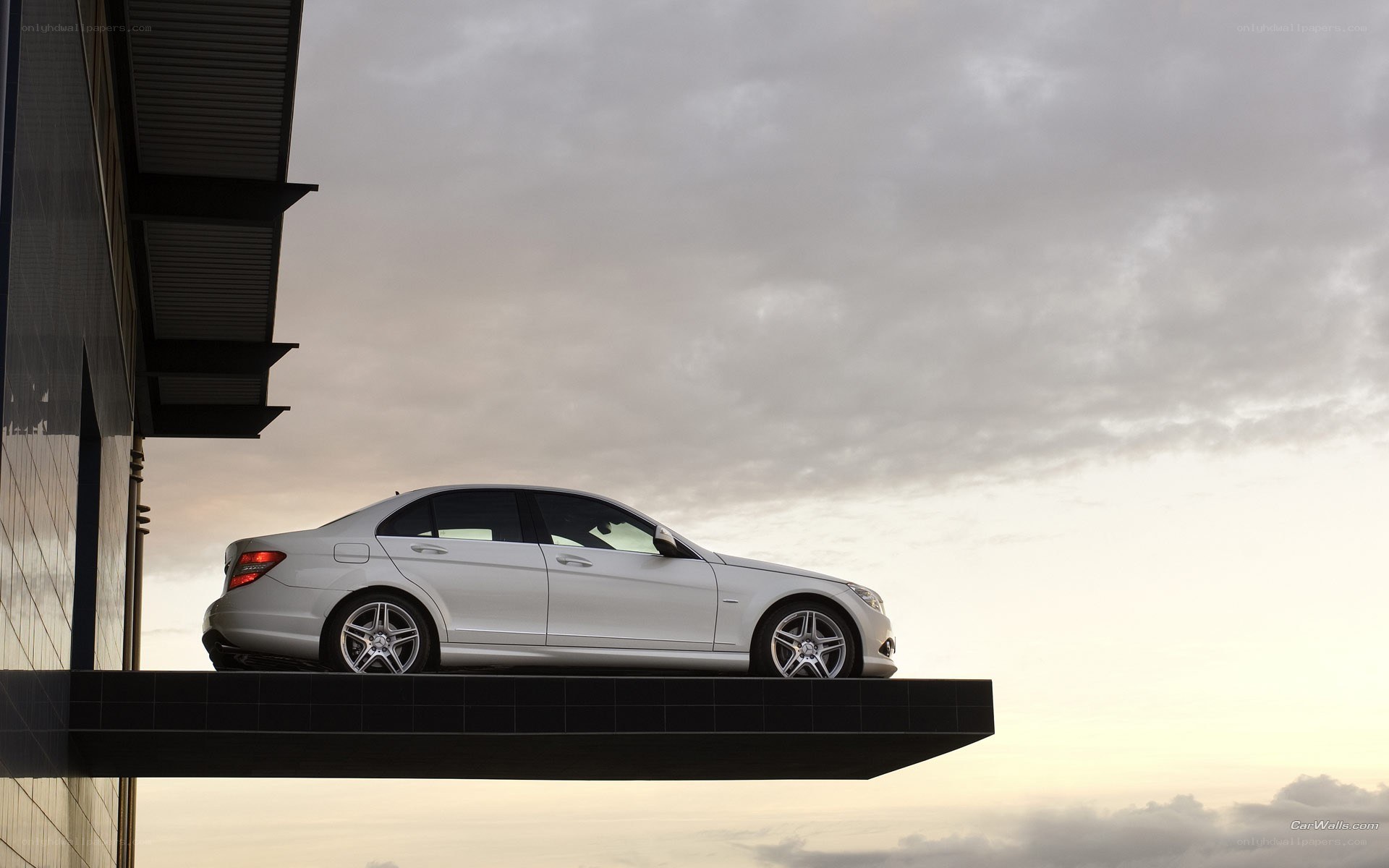 silver sedan on balcony
