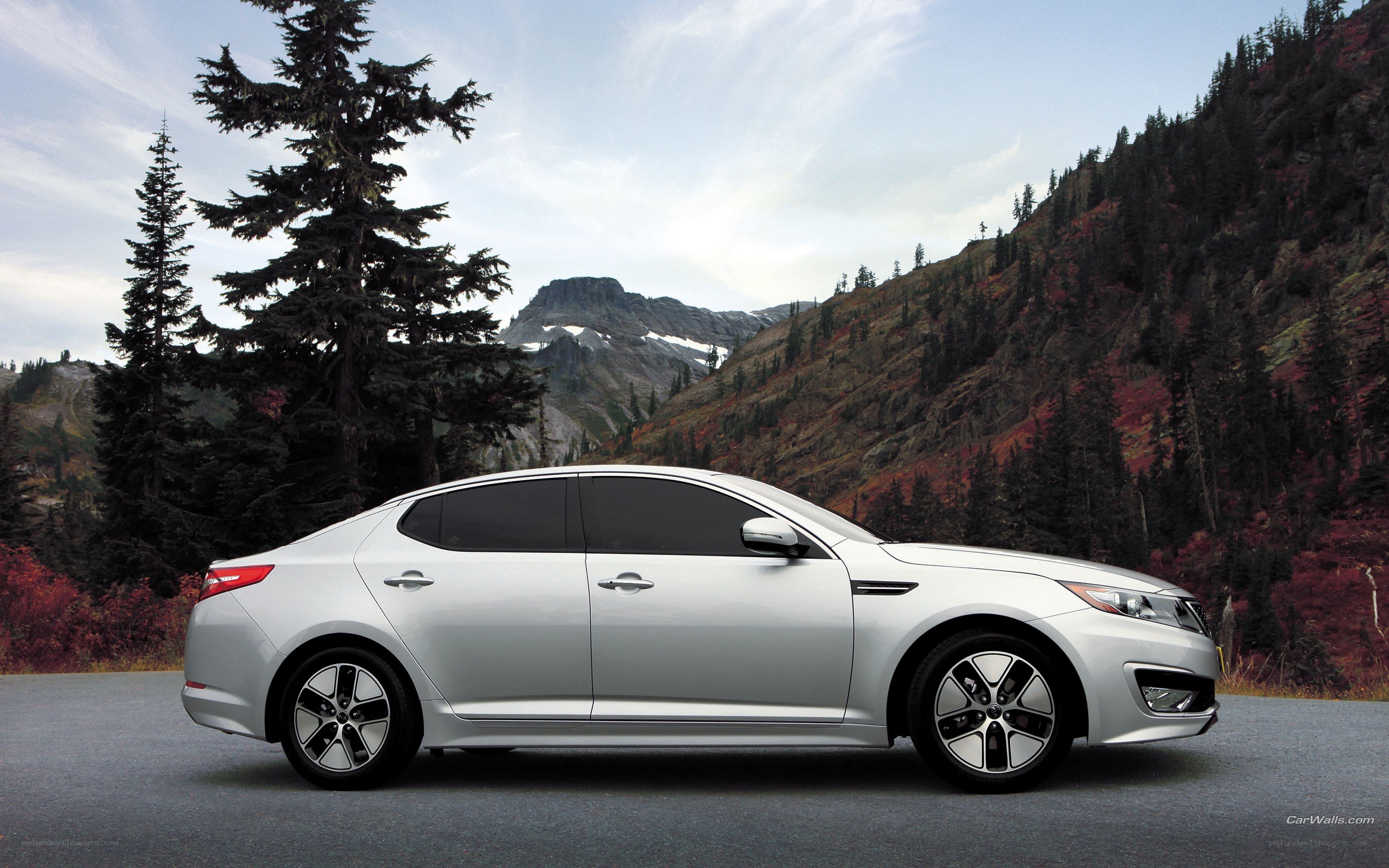 Silver sedan on mountain road