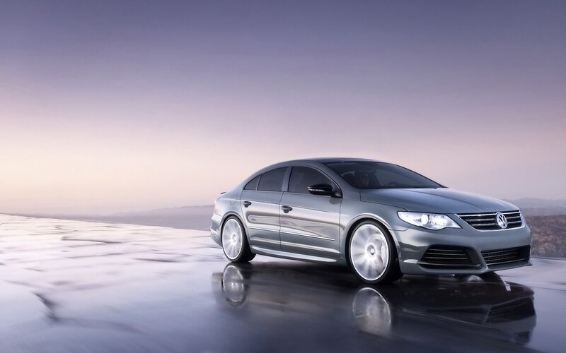 Silver sedan on reflective surface