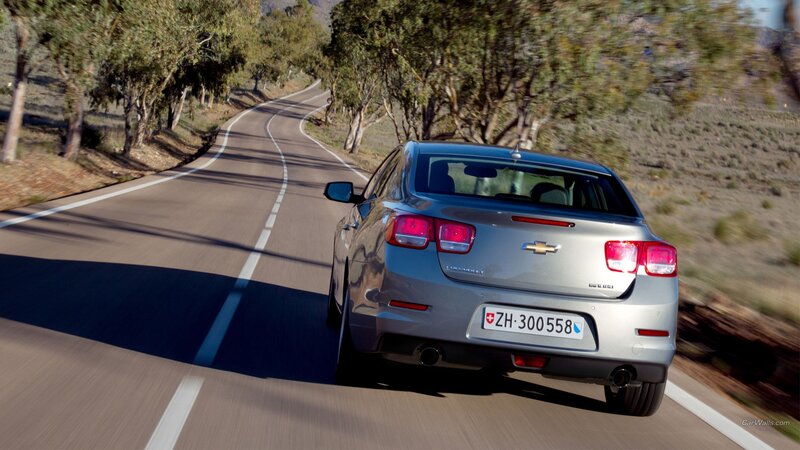 Silver Sedan on Road — Calm