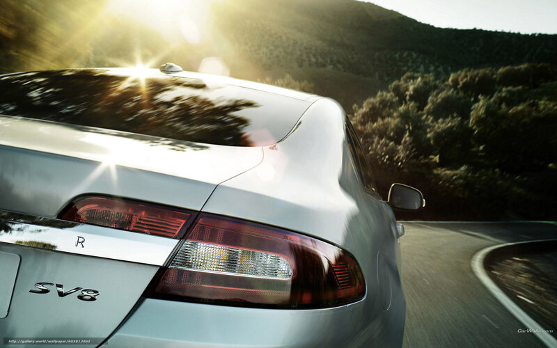 Silver Sedan on Road — Dramatic, Sunset