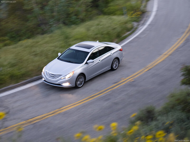 Silver Sedan on Road — Dynamic
