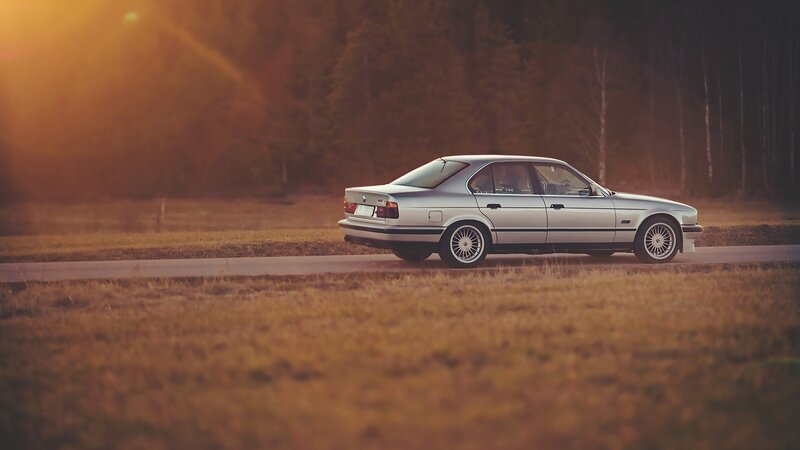 Silver Sedan on Road — Gold