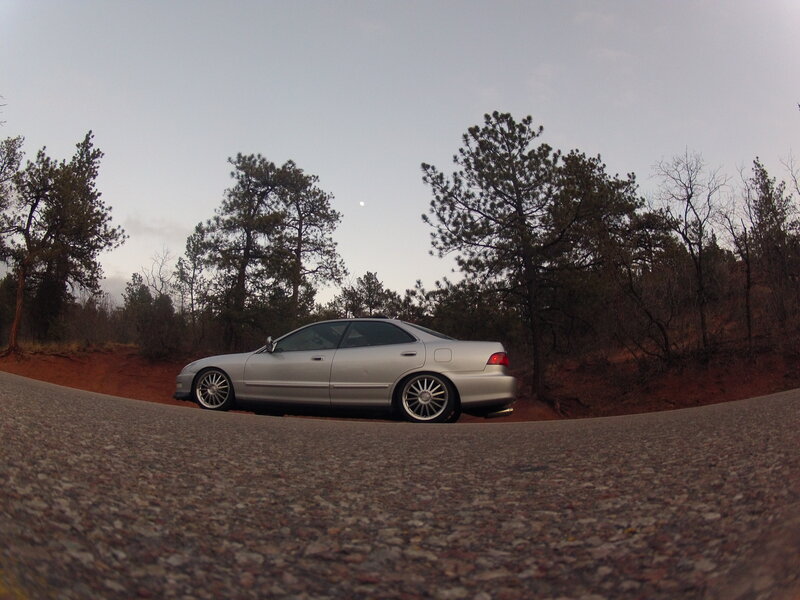 Silver Sedan on Road — Gray, Serene