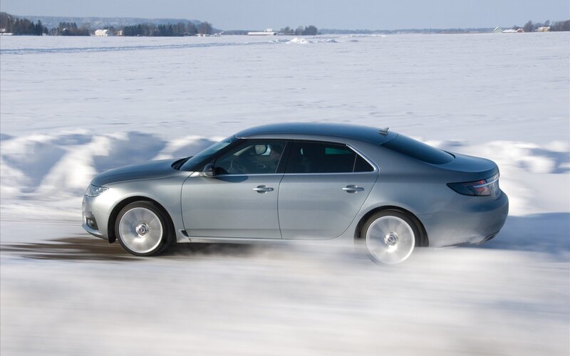 Silver Sedan on Snow