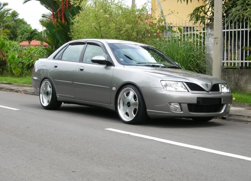 silver sedan on street