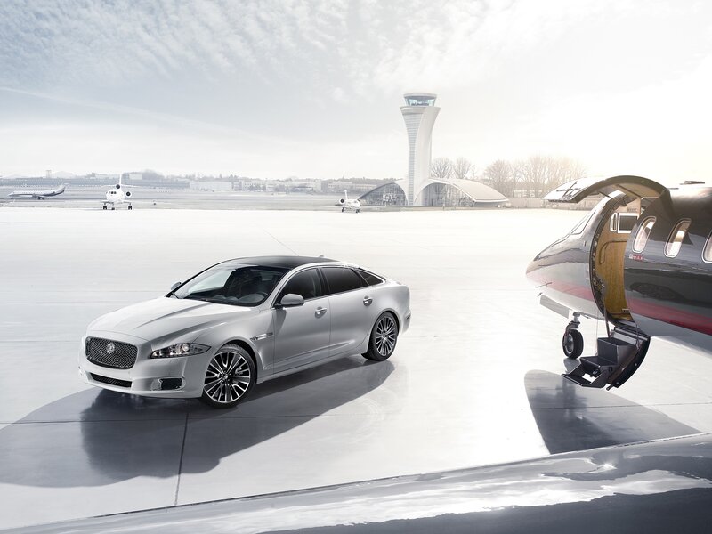 Silver Sedan on Tarmac — White