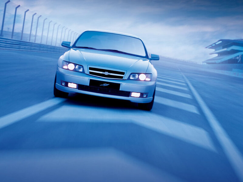 Silver Sedan on Track — Blue