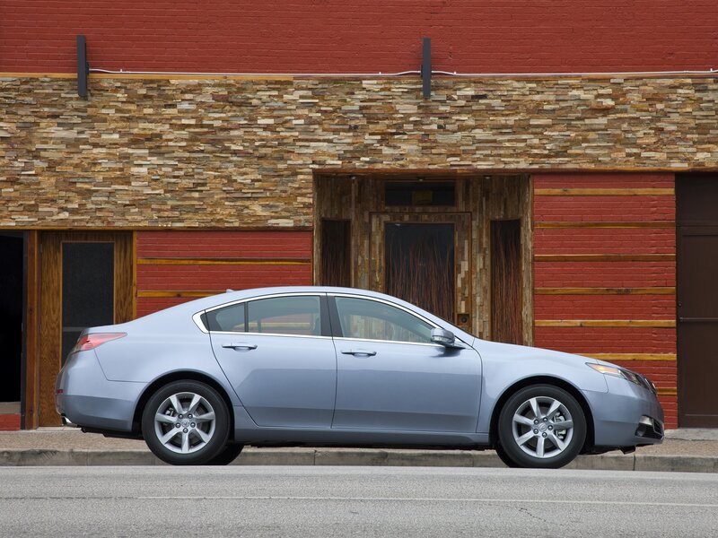 silver sedan parked on street