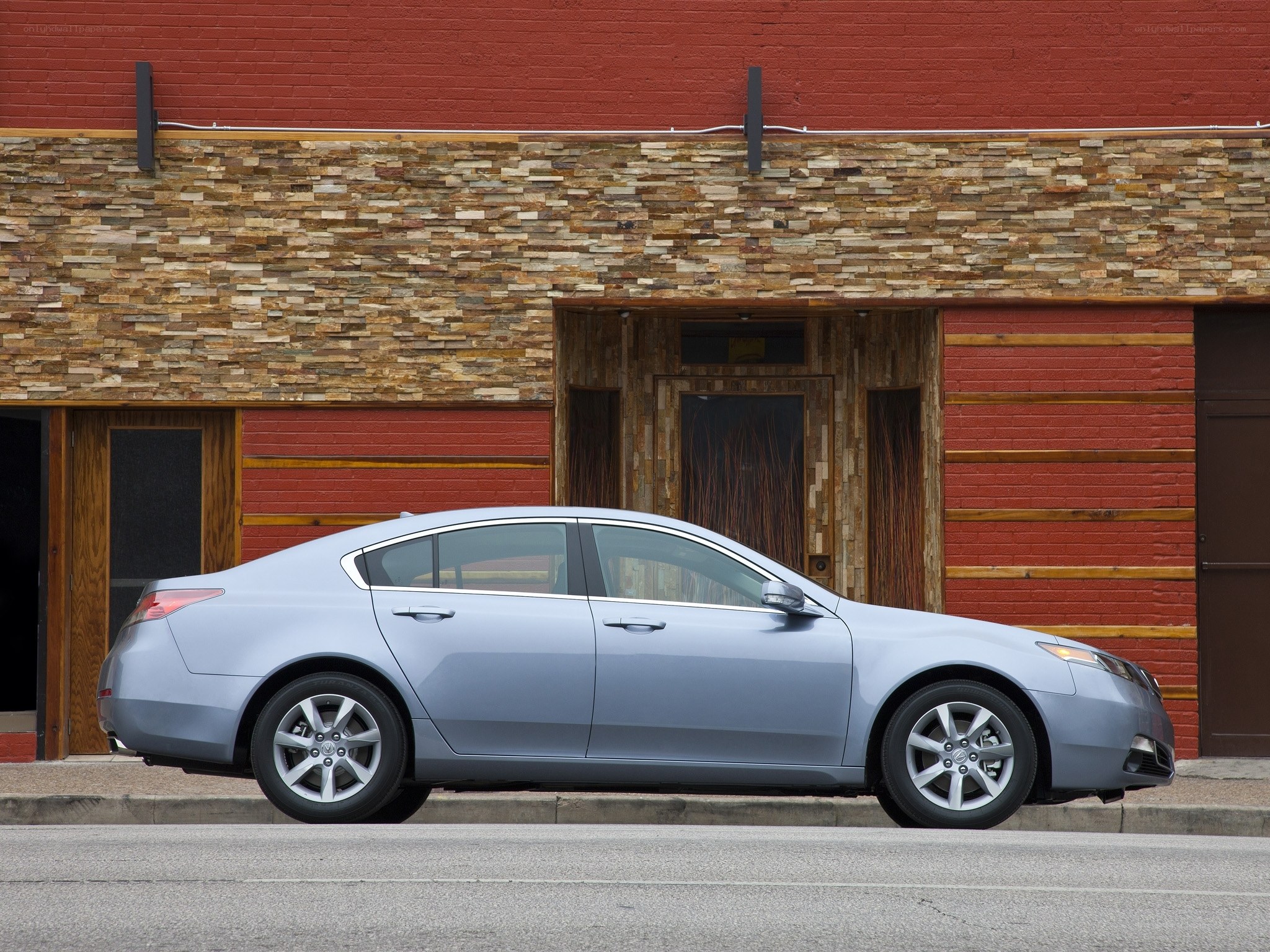 silver sedan parked on street
