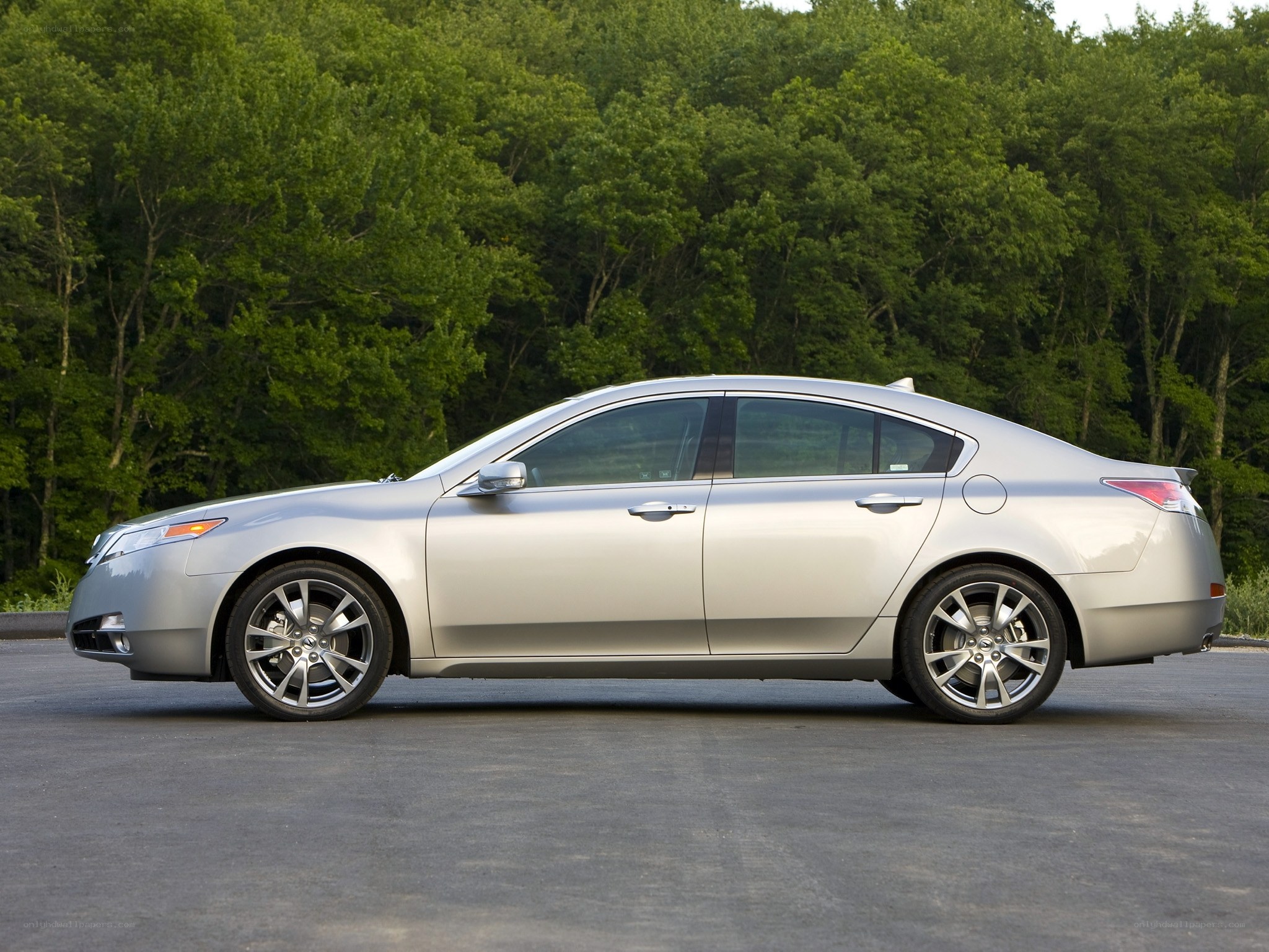 silver sedan parked outdoors