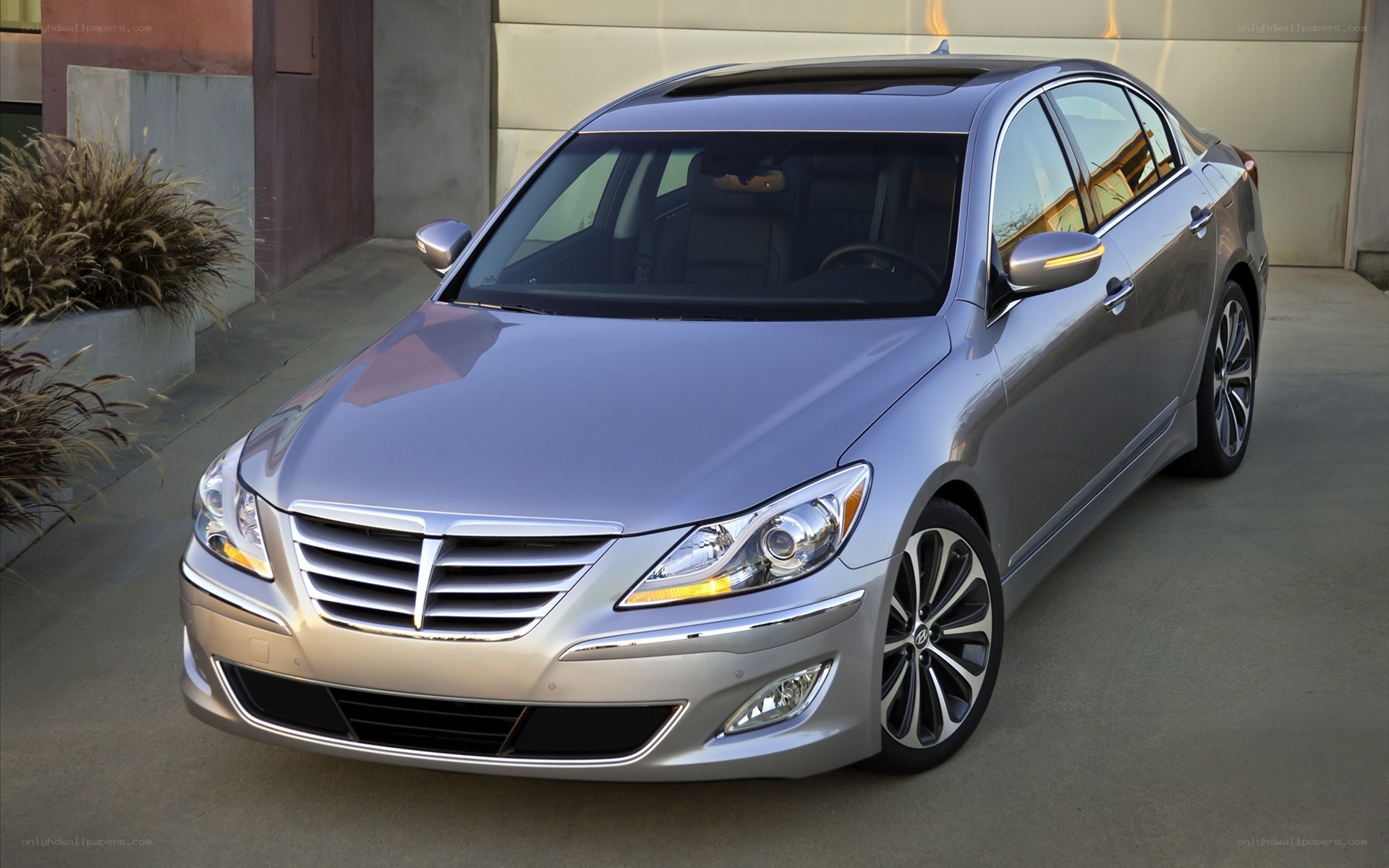 silver sedan parked outside