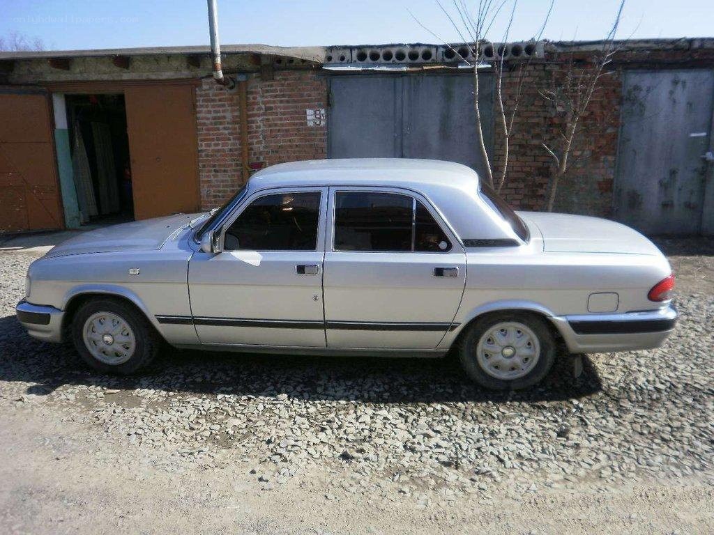 silver sedan parked outside