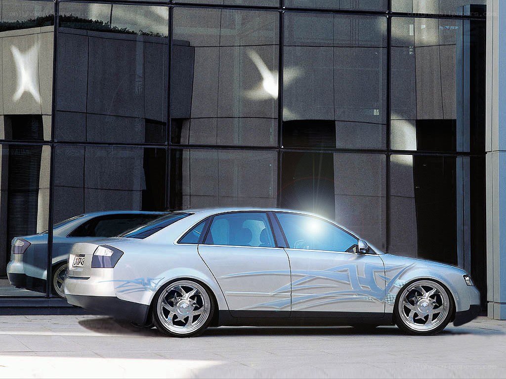 Silver sedan with custom graphics