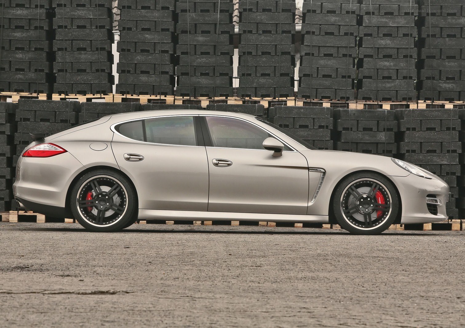 silver sedan with custom wheels