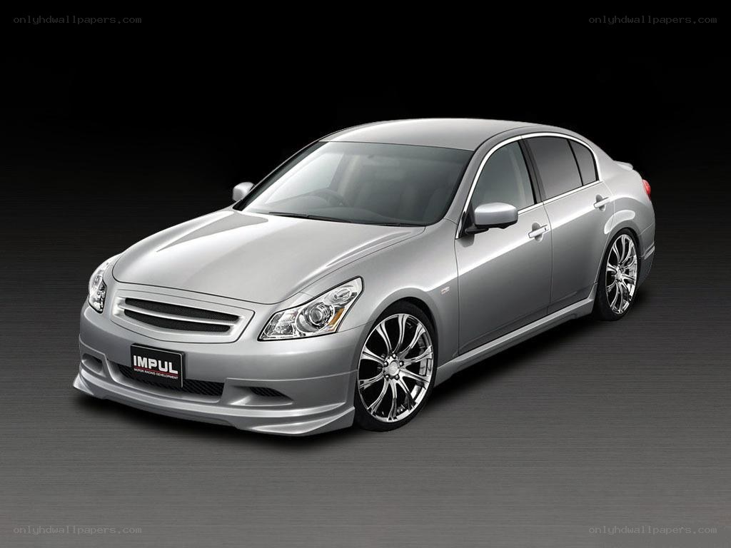 silver sedan with custom wheels