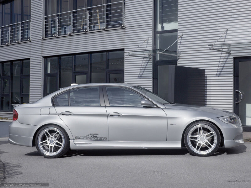 silver sedan with custom wheels