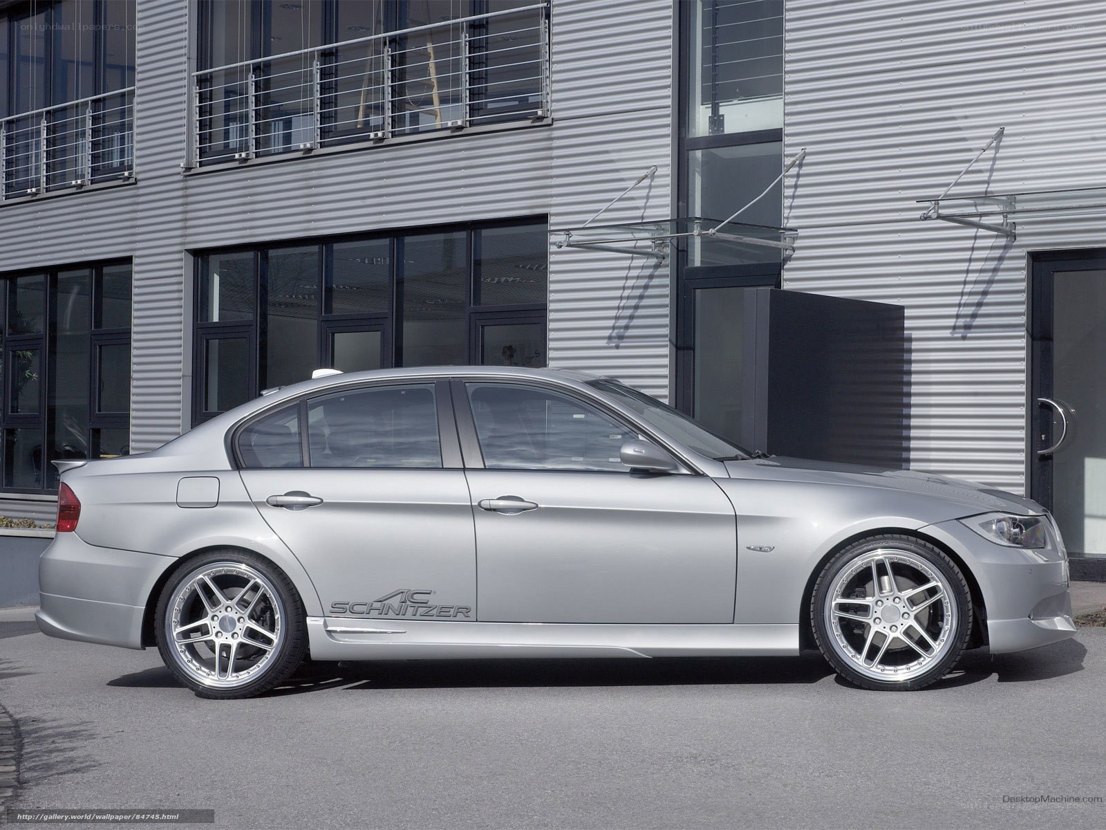 silver sedan with custom wheels