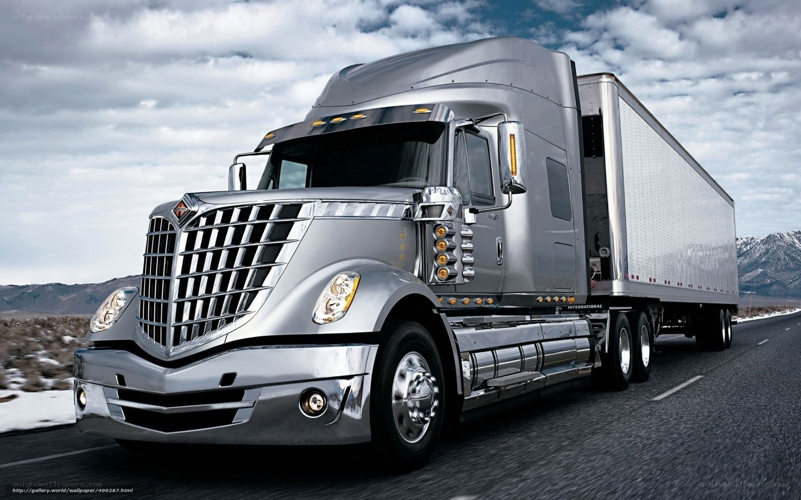 silver semi-truck on highway