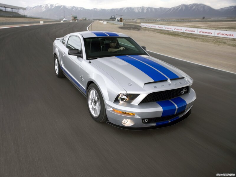 Silver Shelby Mustang on racetrack