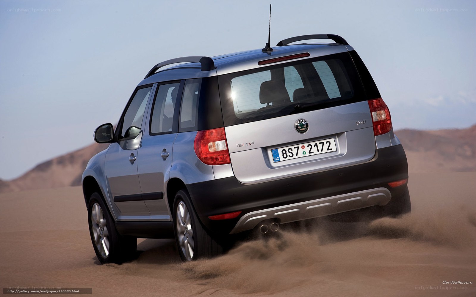 silver skoda suv in desert