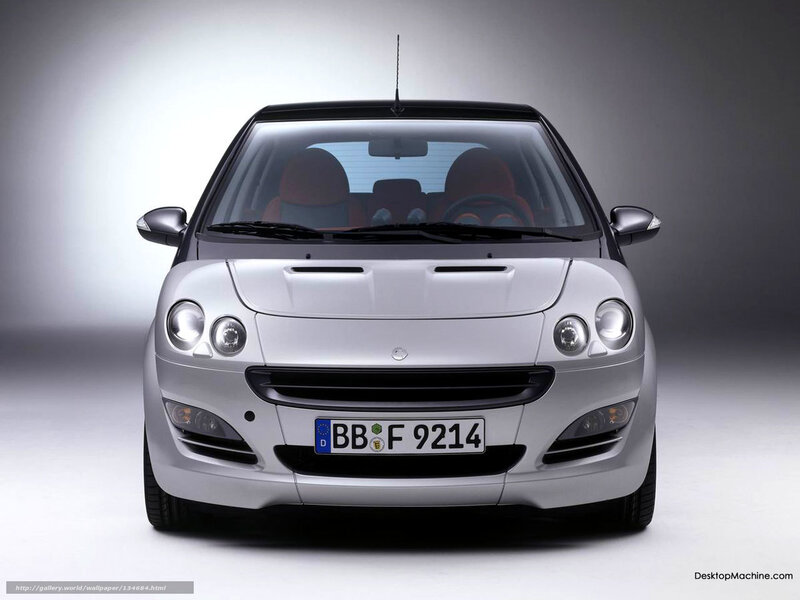 silver smart car front view