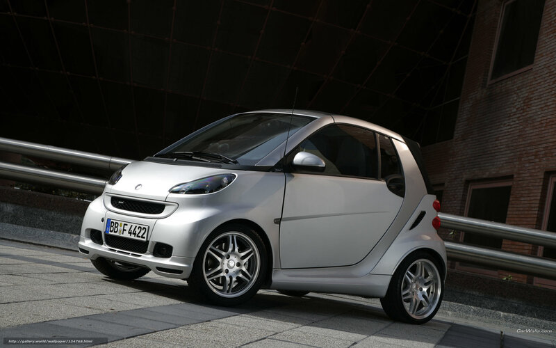 silver smart car on city street