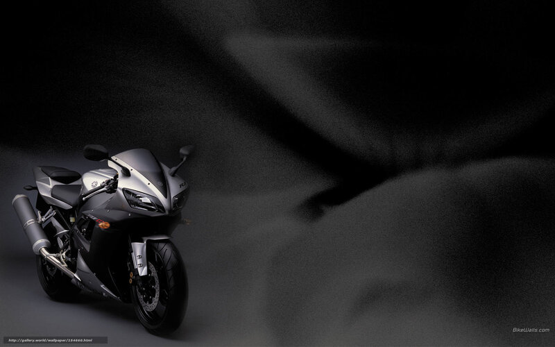 Silver sport motorcycle on dark background