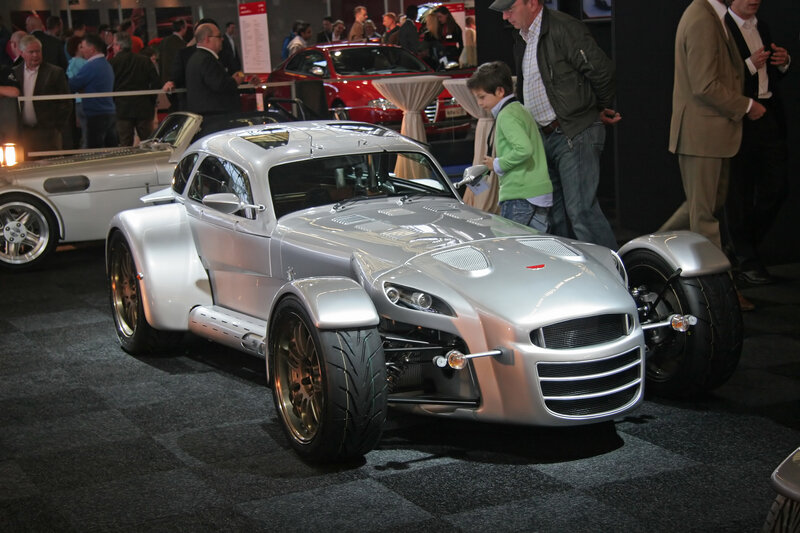 Silver sports car at auto show
