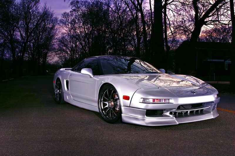 silver sports car at dusk