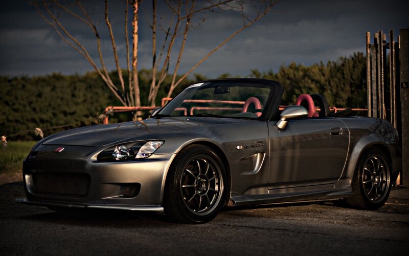silver sports car at dusk