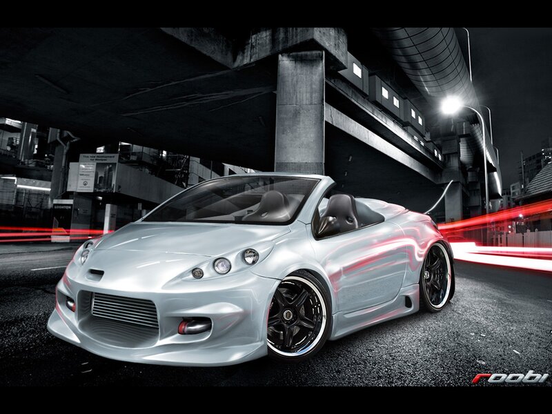 Silver sports car at night